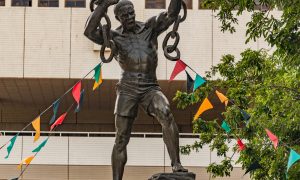 Lusaka city center, cycle with a bicycle around the town, freedom statue on independence street.