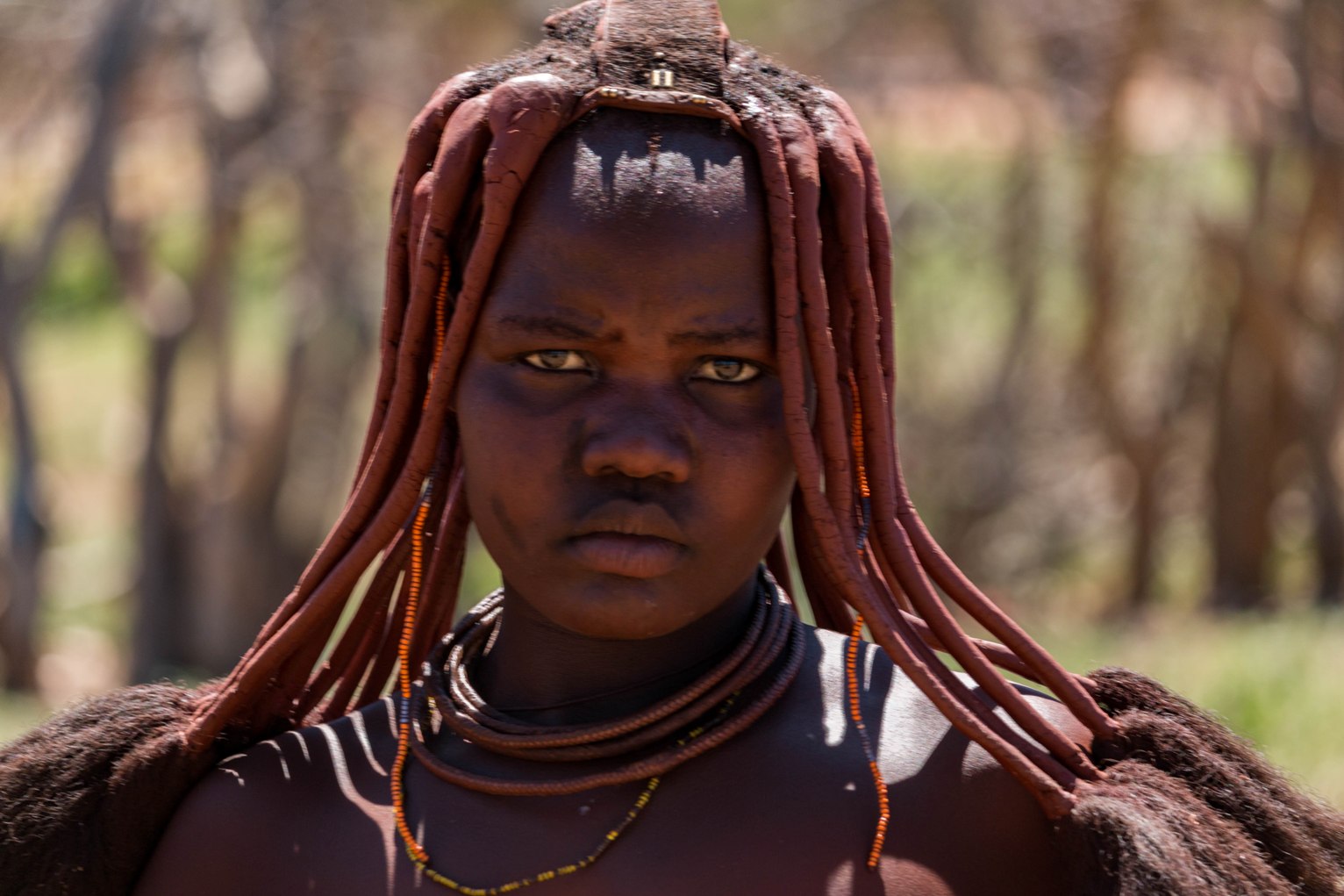 Cycling to Himba tribe in north Namibia near Opuwo on a bicycle.