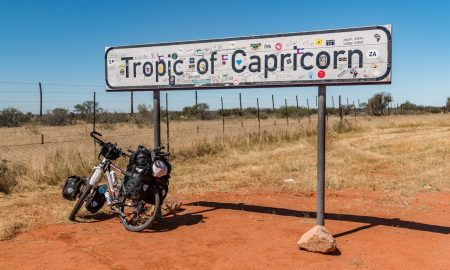 Cycle with my bicycle in Namibia near tropic of capricorn towards cape town