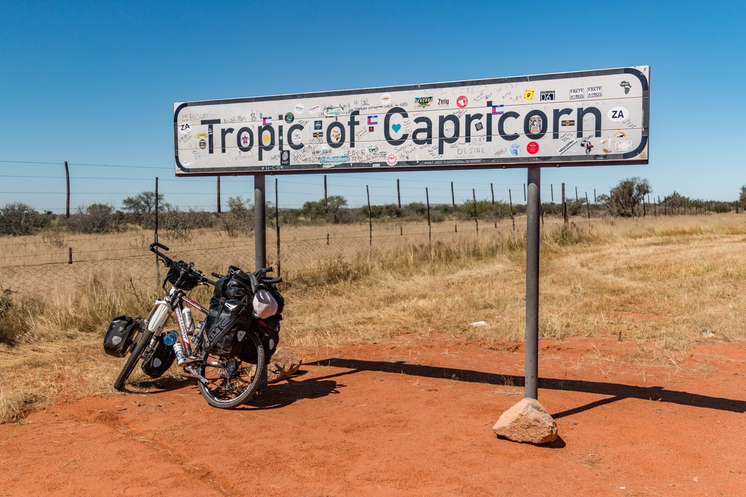 Cycle with my bicycle in Namibia near tropic of capricorn towards cape town