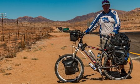 Cycle in South Africa on a bicycle on N7 road to Cape Town from Cairo.